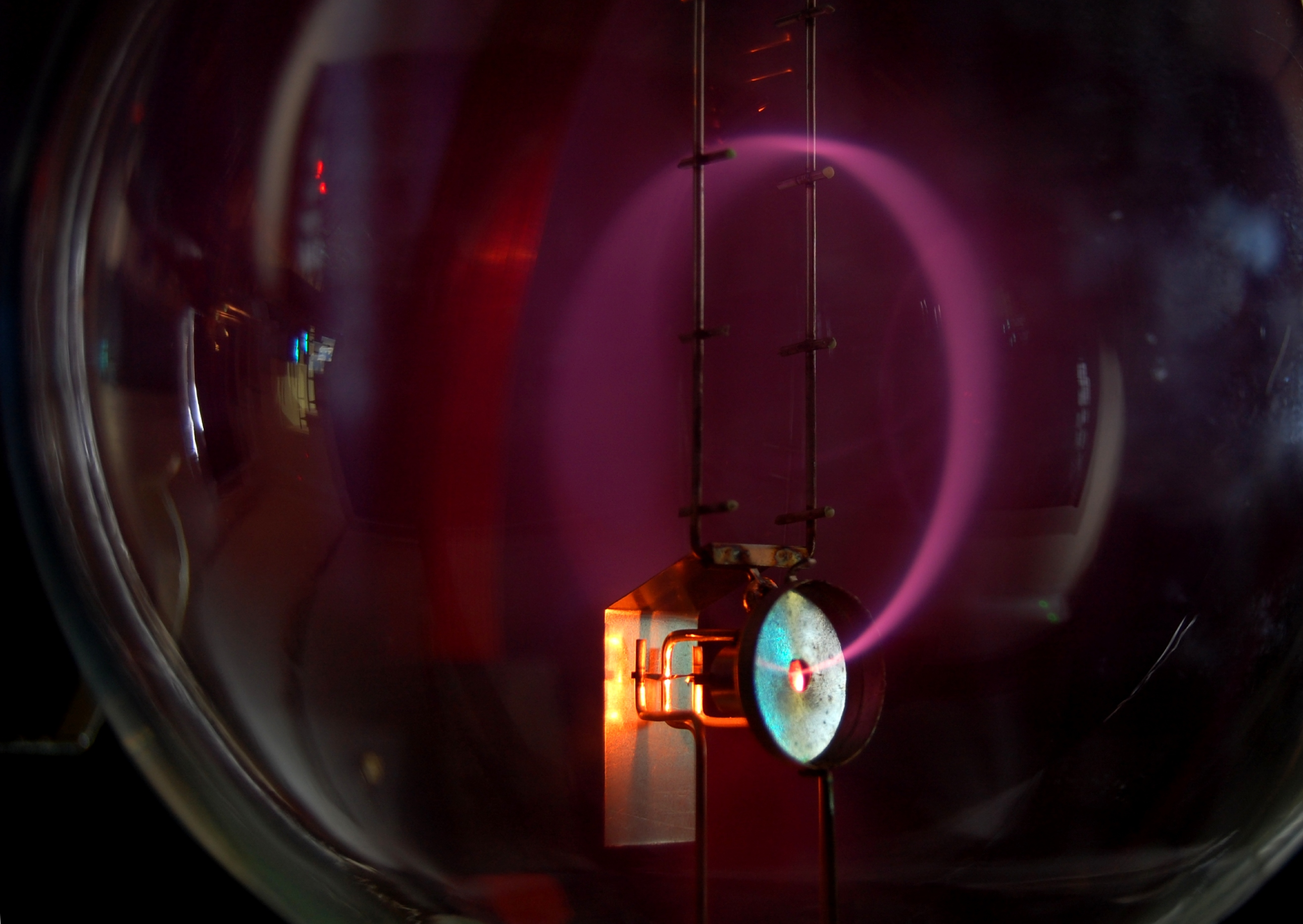 Photograph of an arc emanating from a point.