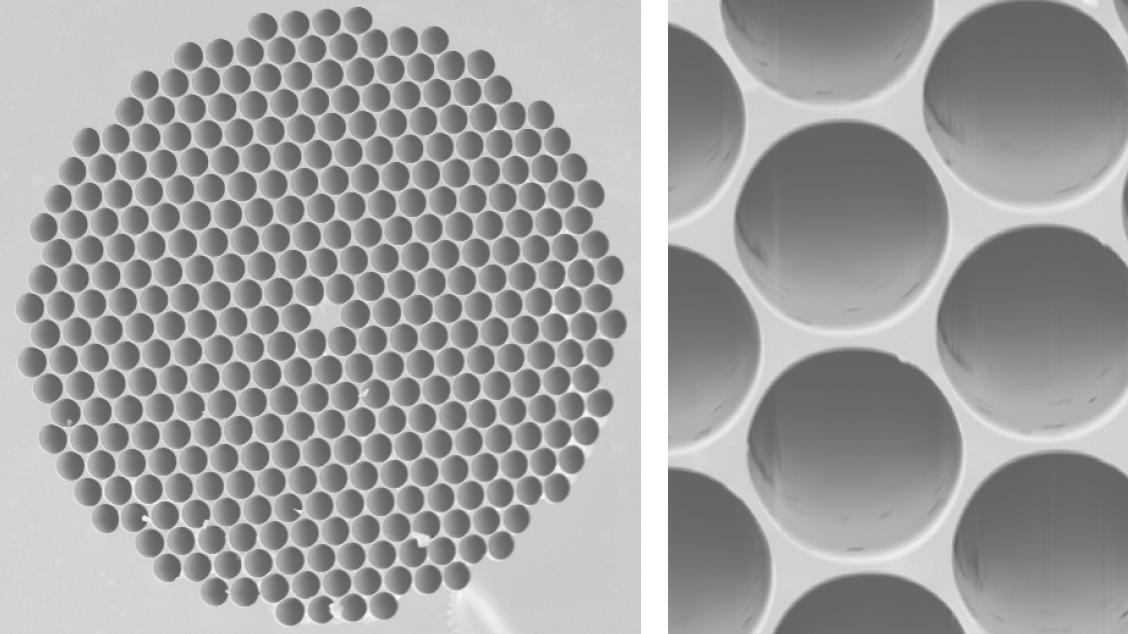 Two grayscale microscope images show a photonic-crystal-fiber cross-section filled with a regular array of air holes and a close-up of several holes.