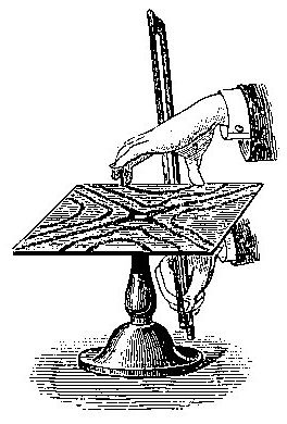 Sand gathered into a branching Chladni pattern on a vibrating surface.