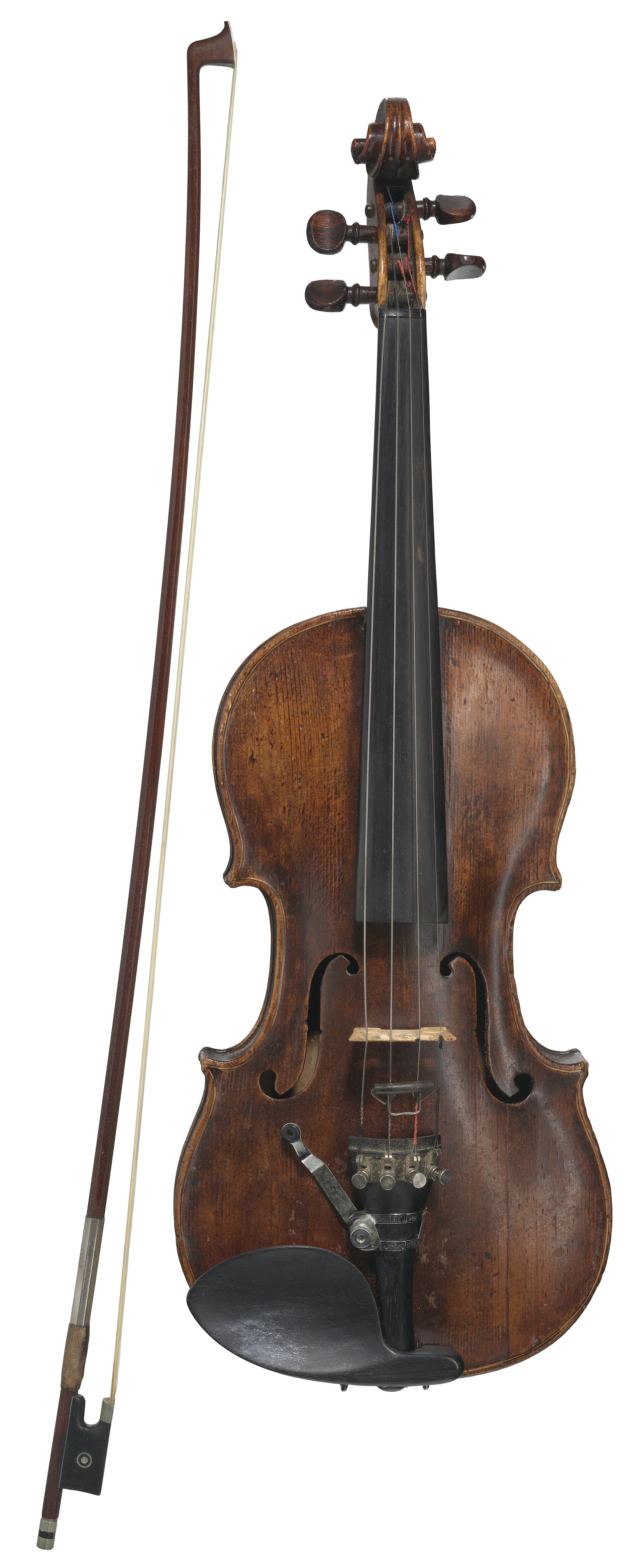 A violin and bow displayed in a museum collection.