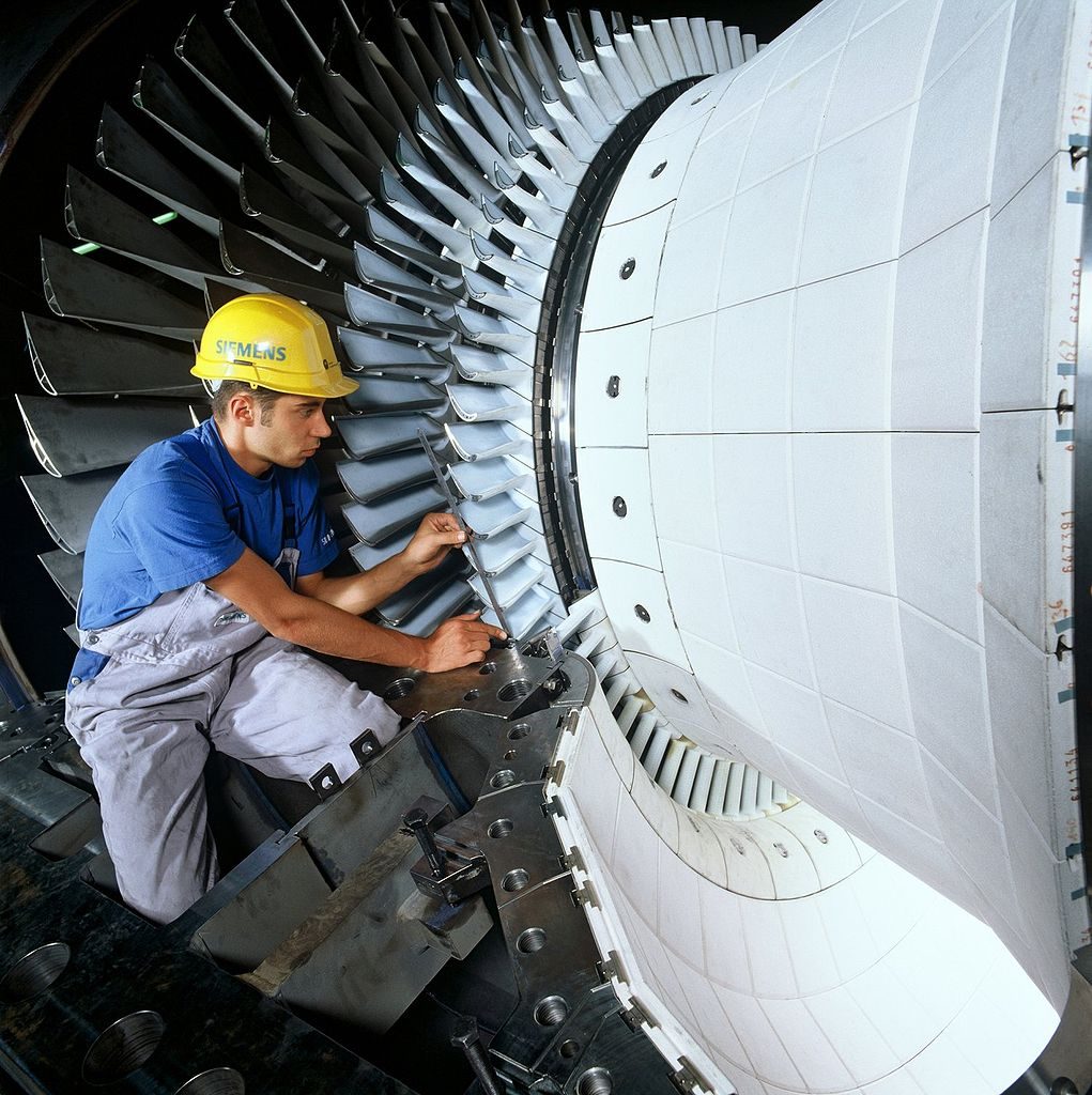 Turbine of a gas generator. The photographed turbine, a Siemens sgt5, can accept an air and water flow rate of 690 kg s−1 (1521 lb/s). It delivers approximately 500 MW of shaft power.