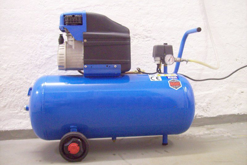 A small electric compressor mounted on a portable air tank